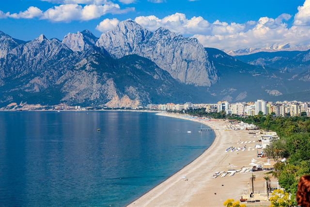 Konyaaltı Beach curving along Antalya's coast below the jagged Beydağları mountains