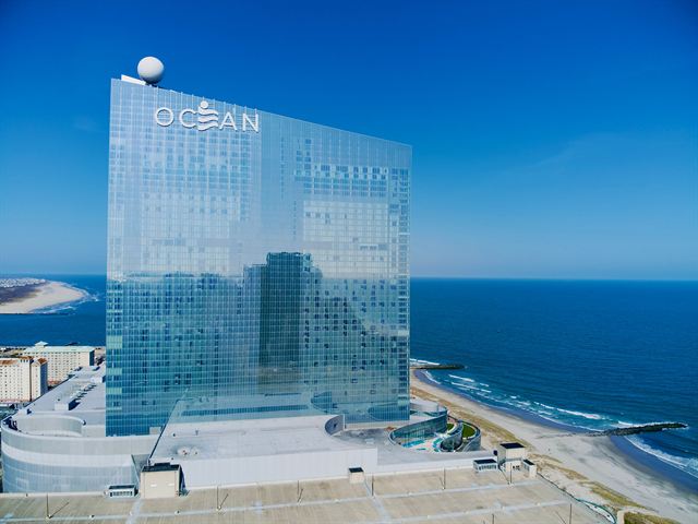 Aerial view of the glass Ocean Casino Resort tower on the Atlantic City beachfront