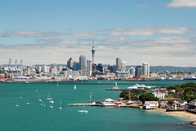 Auckland skyline and Sky Tower across the harbor seen from Devonport, New Zealand