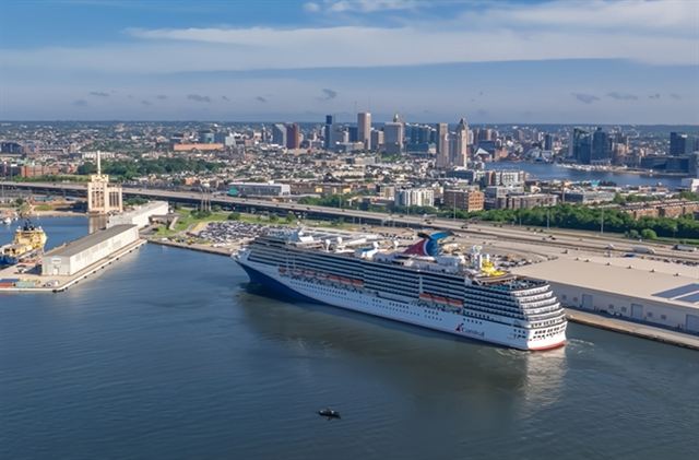 Cruise ship at the Baltimore terminal with the downtown skyline and harbor behind
