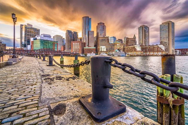 Boston skyline from the harbor waterfront at sunset