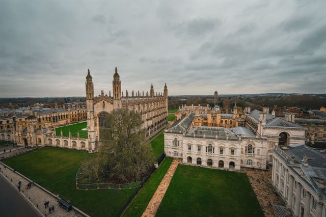 Aerial view of King's College Chapel and surrounding Cambridge colleges with green lawns