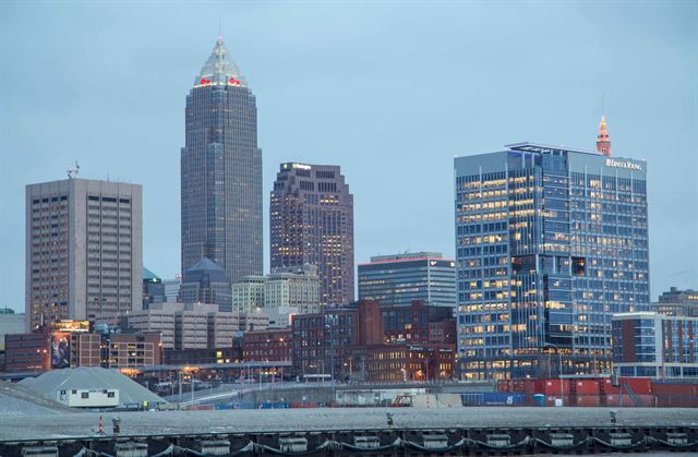 Downtown Cleveland skyline with Key Tower and glass office buildings seen across the lakefront rail yards