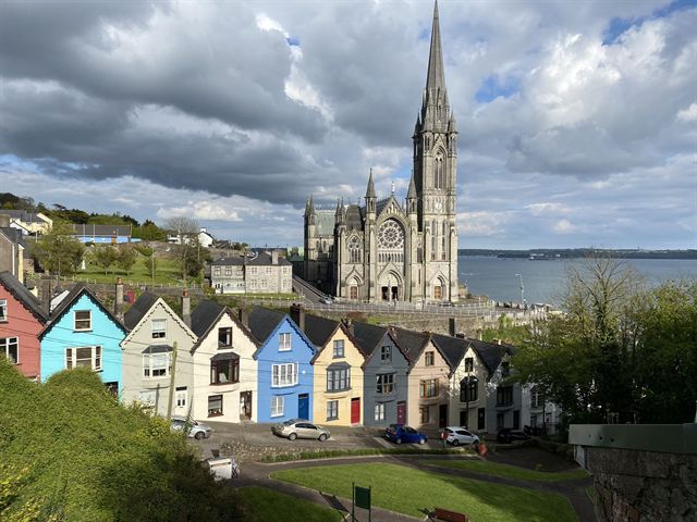 St Colman's Cathedral above the colorful Deck of Cards houses in Cobh on Cork Harbour