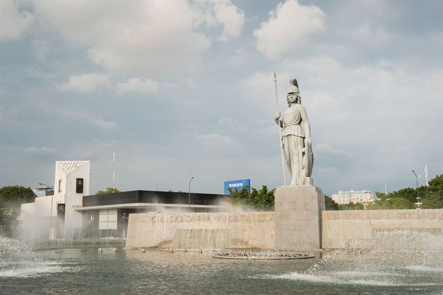 Minerva statue on its pedestal above the fountain at the Glorieta Minerva in Guadalajara