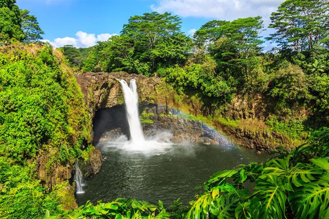 Rainbow Falls near Hilo with a rainbow in the mist
