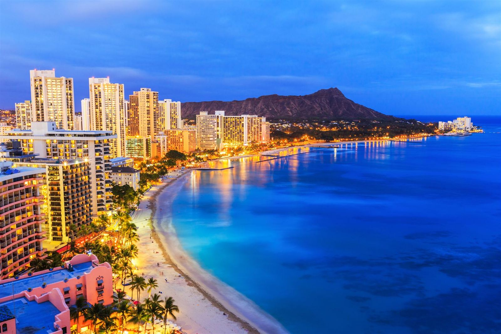 Waikiki Beach hotels and Diamond Head at dusk