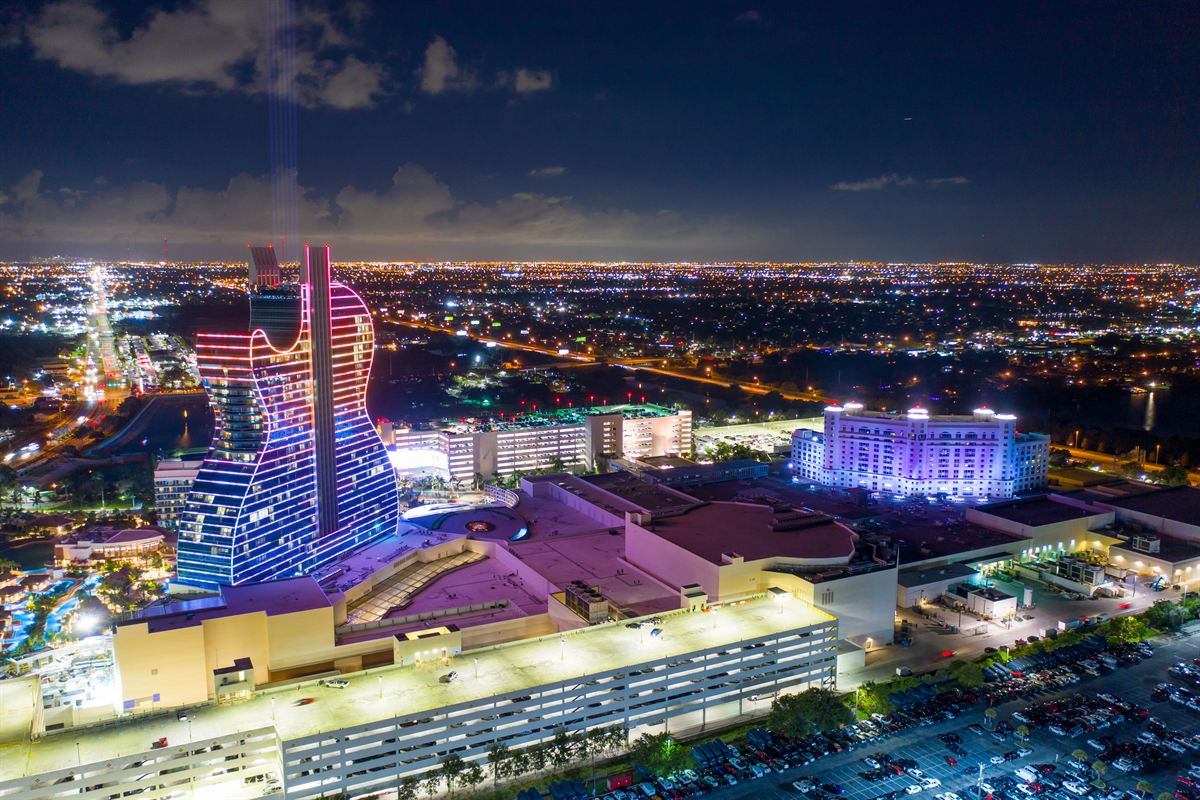 The guitar-shaped Hard Rock hotel tower lit at night