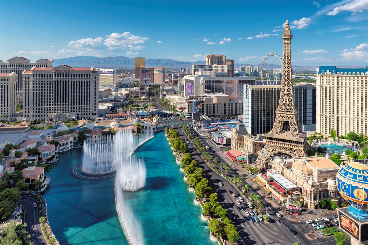 The Bellagio fountains and the Paris Las Vegas Eiffel Tower on the Strip