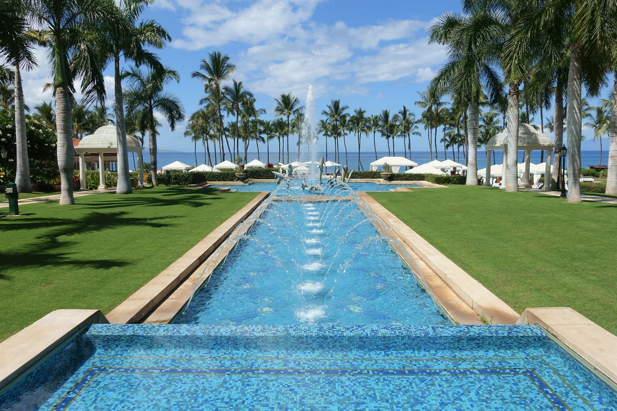 Fountain walk through the palm-lined gardens of the Grand Wailea, Maui