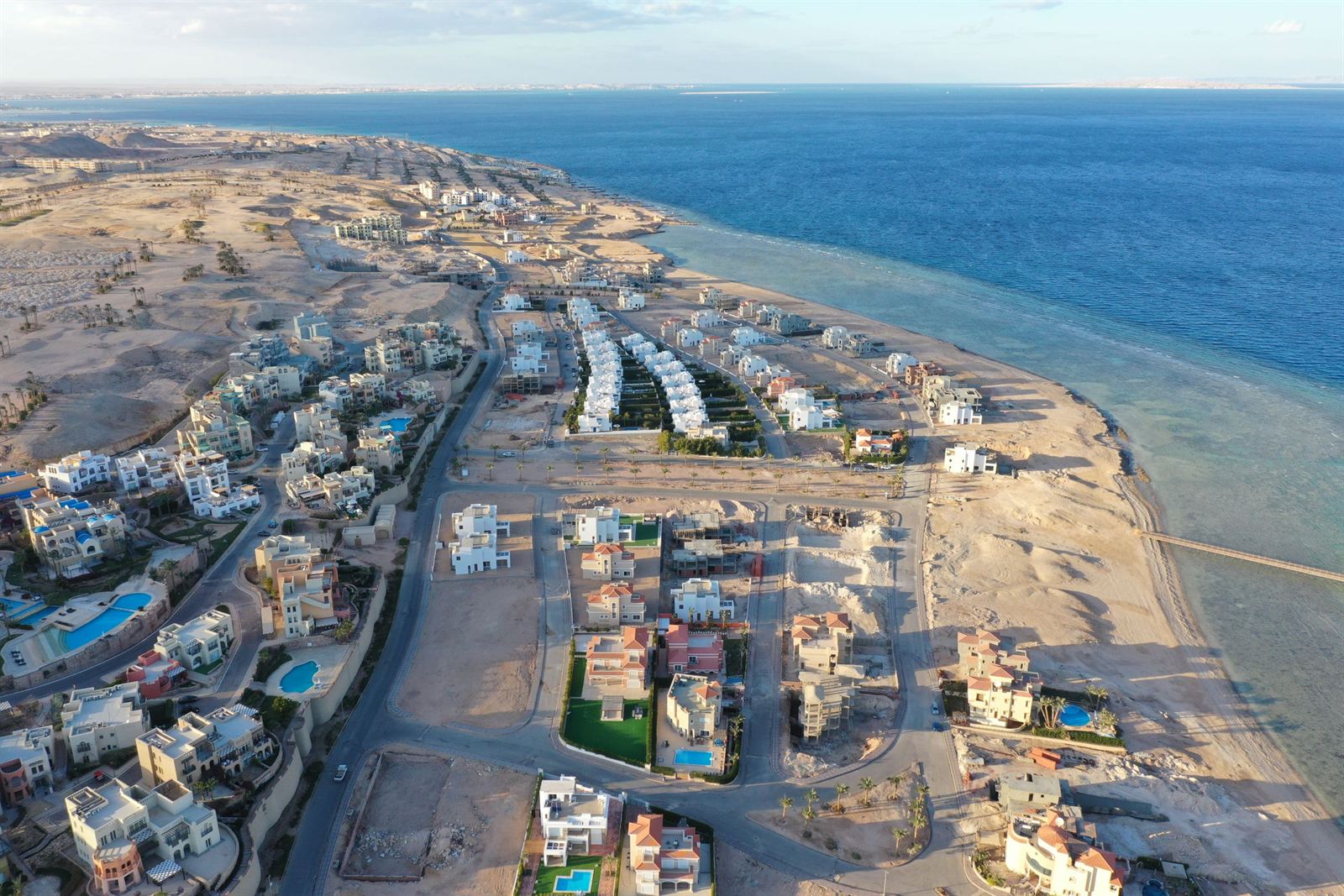Aerial view of Hurghada coastal villas, roads and beach along the Red Sea