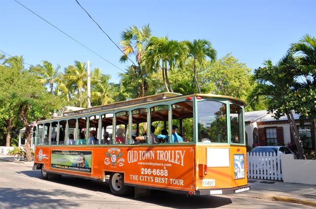 Orange Old Town Trolley on a Key West street