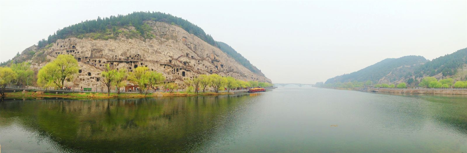 Panorama of the Yi River and cliffs of the Longmen Grottoes near Luoyang