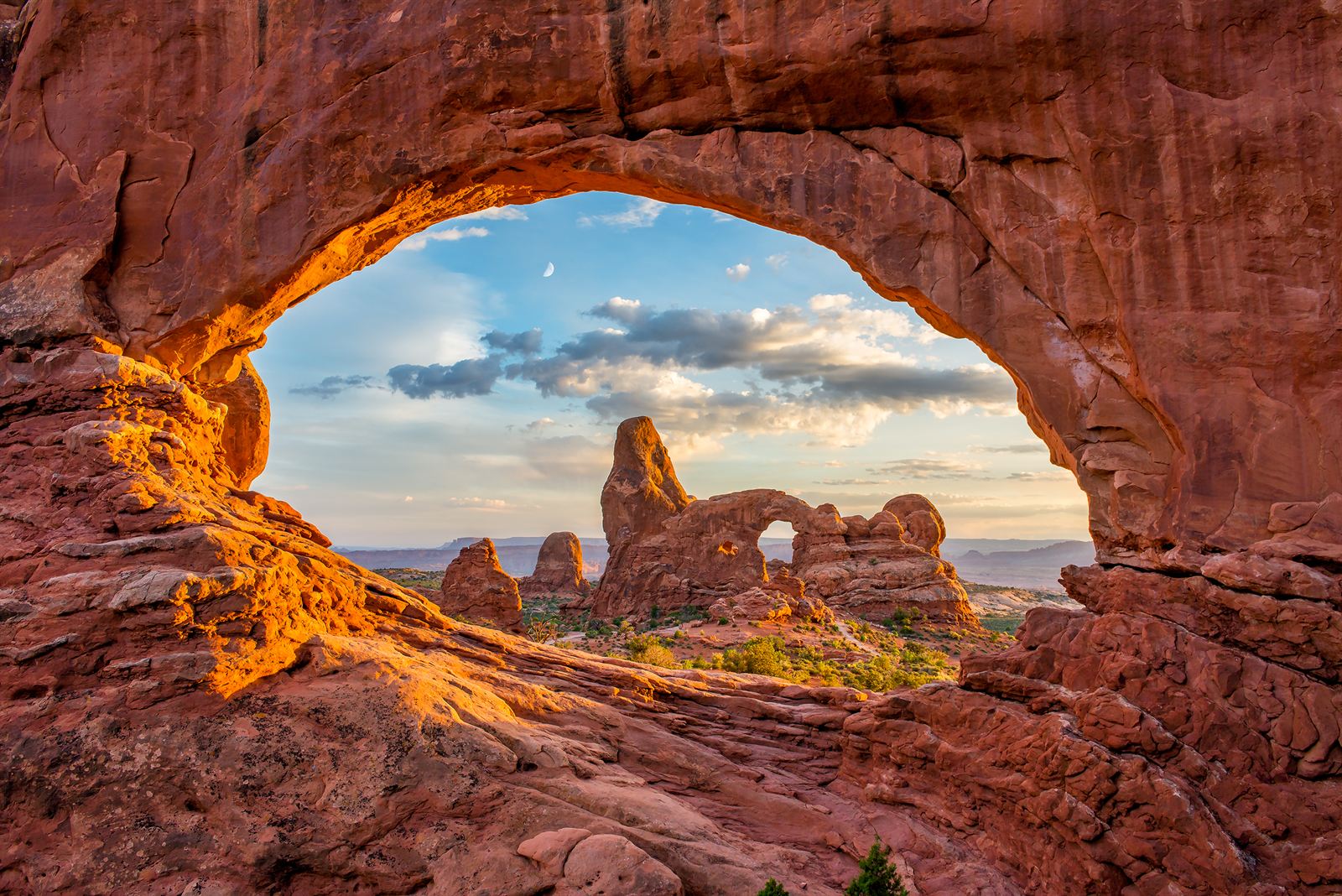 Turret Arch framed by North Window at sunrise, Arches National Park near Moab