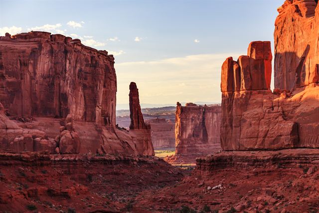 Red sandstone walls and towers of Park Avenue in Arches National Park, Moab