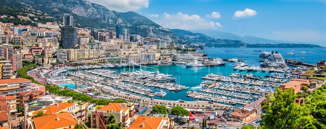 Aerial view of Port Hercule marina and Monte Carlo's apartment blocks, Monaco