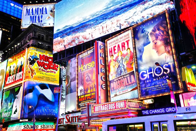 Broadway show billboards lighting up Times Square