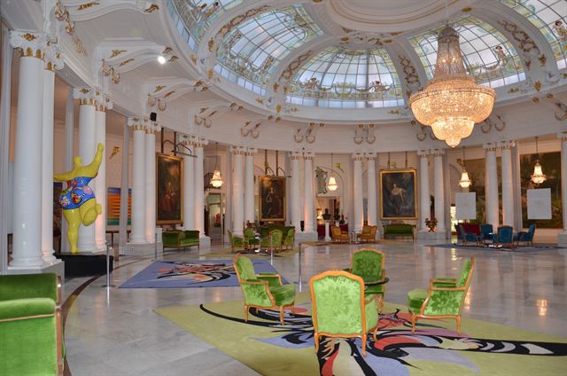Grand domed Salon Royal of the Hotel Negresco in Nice with crystal chandelier and art