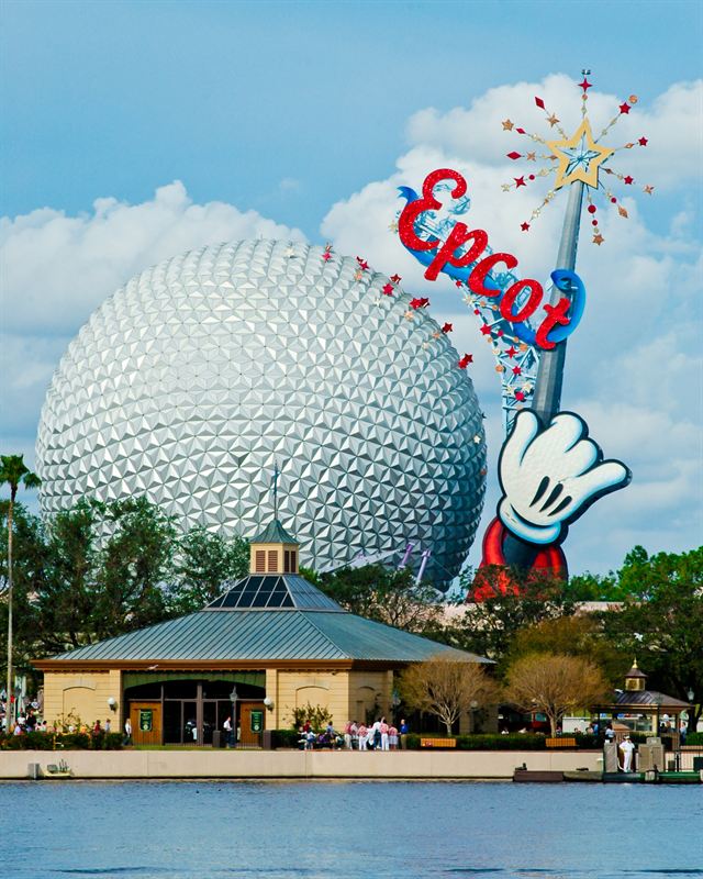 Epcot's Spaceship Earth sphere behind the Epcot sign (portrait)