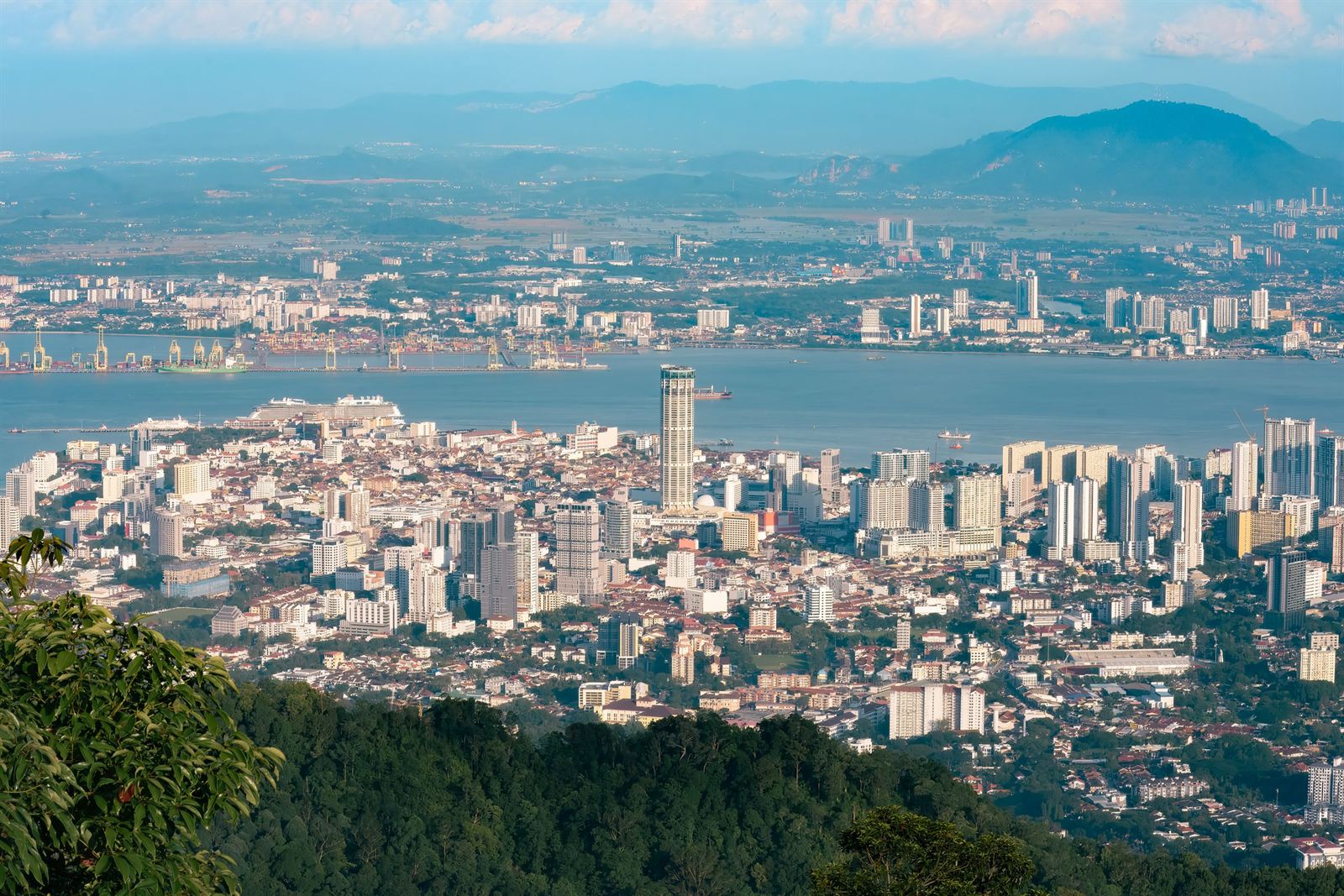 George Town, Penang skyline from Penang Hill, with the strait and mainland mountains beyond