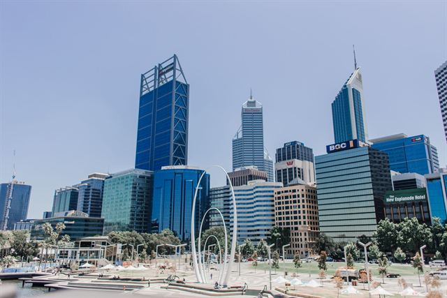 Elizabeth Quay in Perth with the Spanda arch sculpture, marina and blue glass office towers