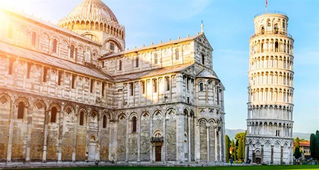 Leaning Tower of Pisa beside the marble Pisa Cathedral on the Piazza dei Miracoli