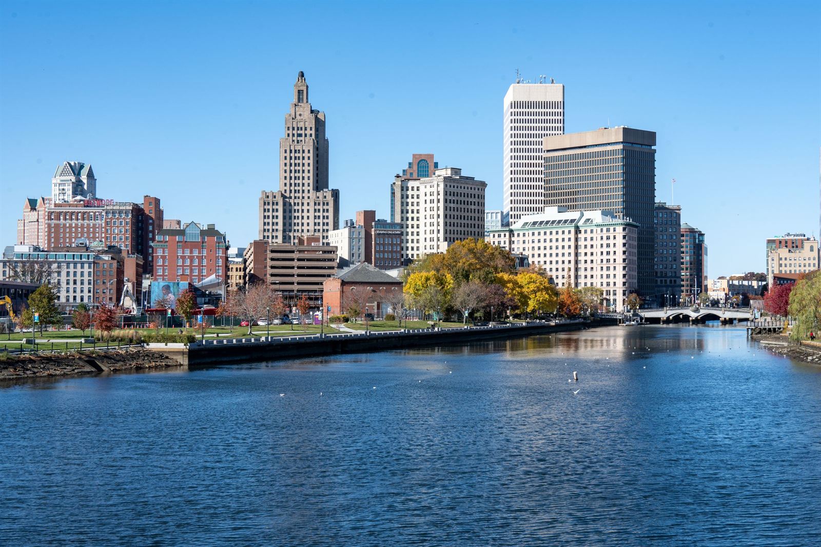 Downtown Providence, Rhode Island skyline with the Industrial Trust building across the river in autumn