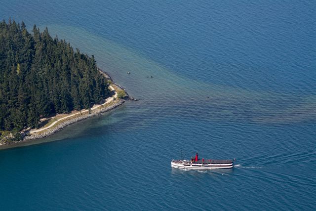 Aerial view of the TSS Earnslaw steamship crossing Lake Wakatipu near Queenstown