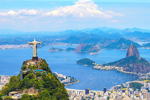 Christ the Redeemer atop Corcovado overlooking Guanabara Bay, Sugarloaf Mountain and Rio de Janeiro