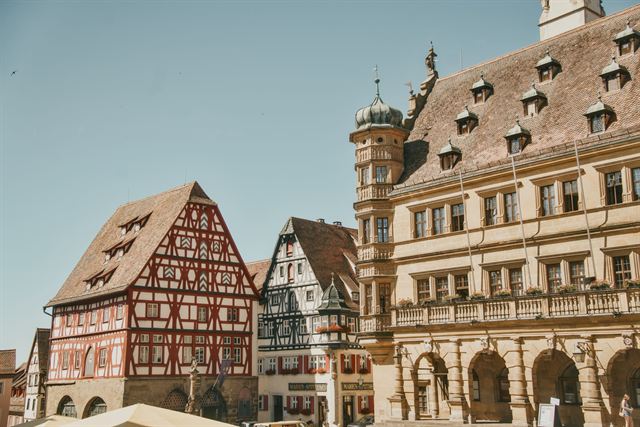 Half-timbered houses beside the Renaissance town hall on the Marktplatz in Rothenburg ob der Tauber