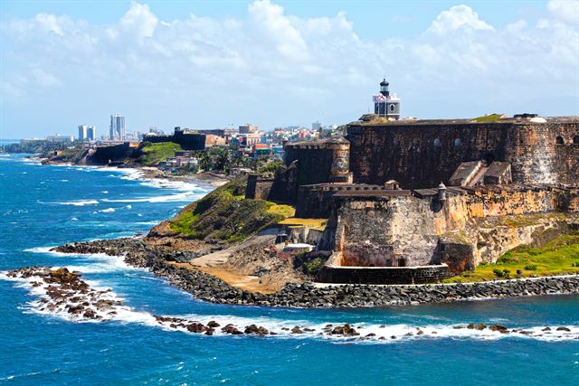 El Morro fortress and lighthouse on the rocky headland above the Atlantic in Old San Juan, Puerto Rico