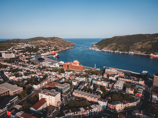 Aerial view of St. John's, Newfoundland with colorful downtown rows, the harbour and the Narrows to the Atlantic