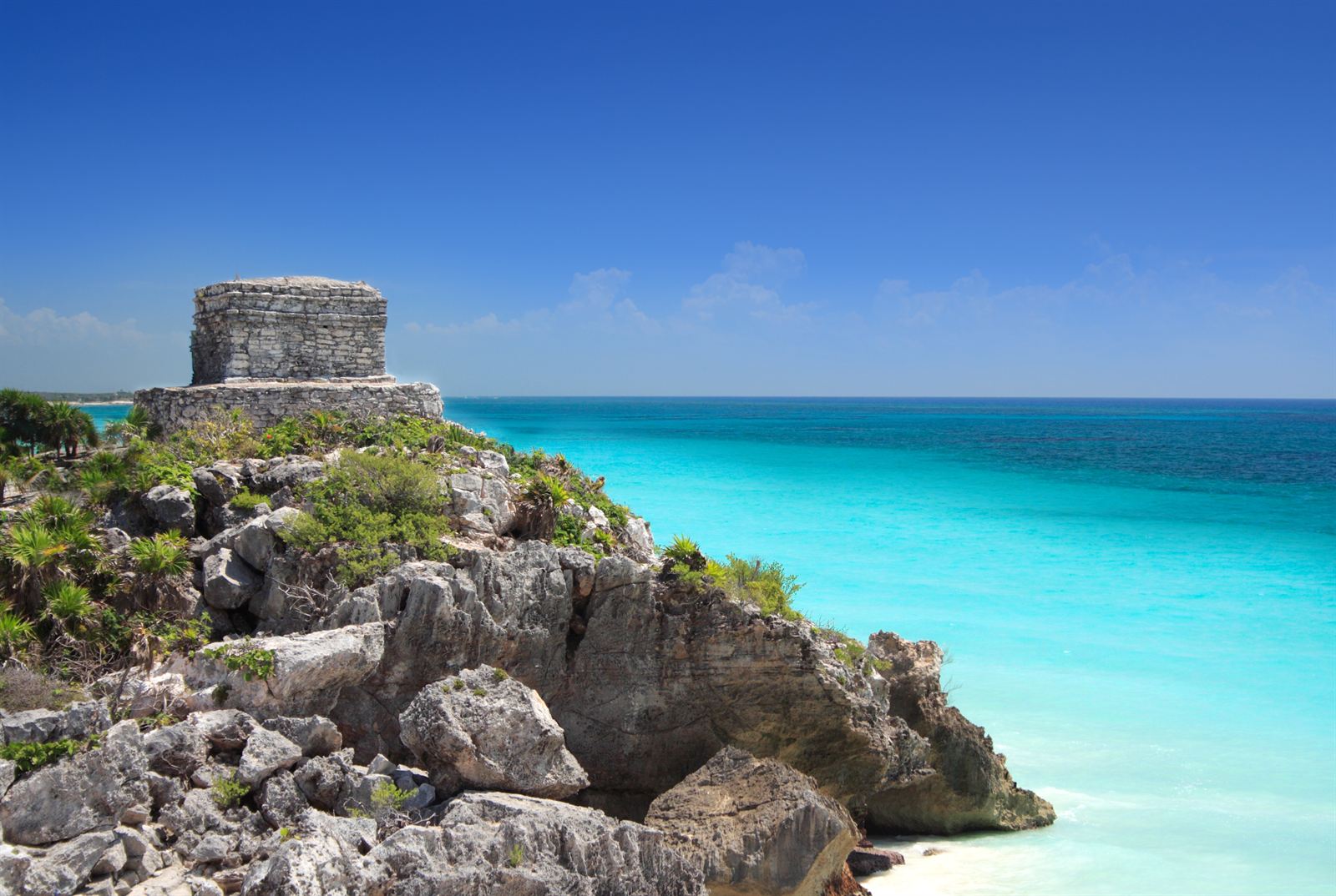 Tulum's Maya ruin on a clifftop above turquoise Caribbean water