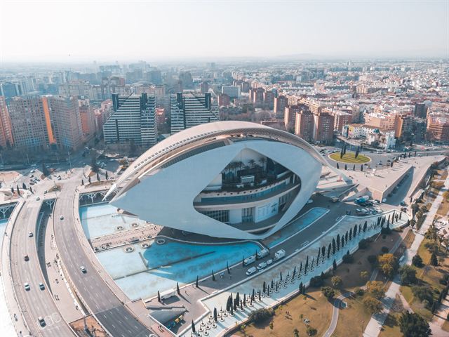 Aerial view of the Palau de les Arts Reina Sofia opera house and Valencia city beyond