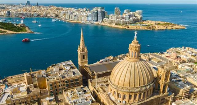 Aerial view of Valletta with the Carmelite Church dome, St Paul spire and Marsamxett Harbour