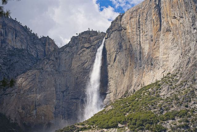 Yosemite Falls plunging down sheer granite cliffs in Yosemite National Park